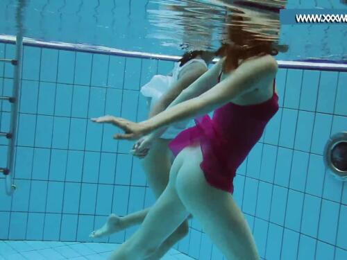 Hotly clad nubiles in the pool